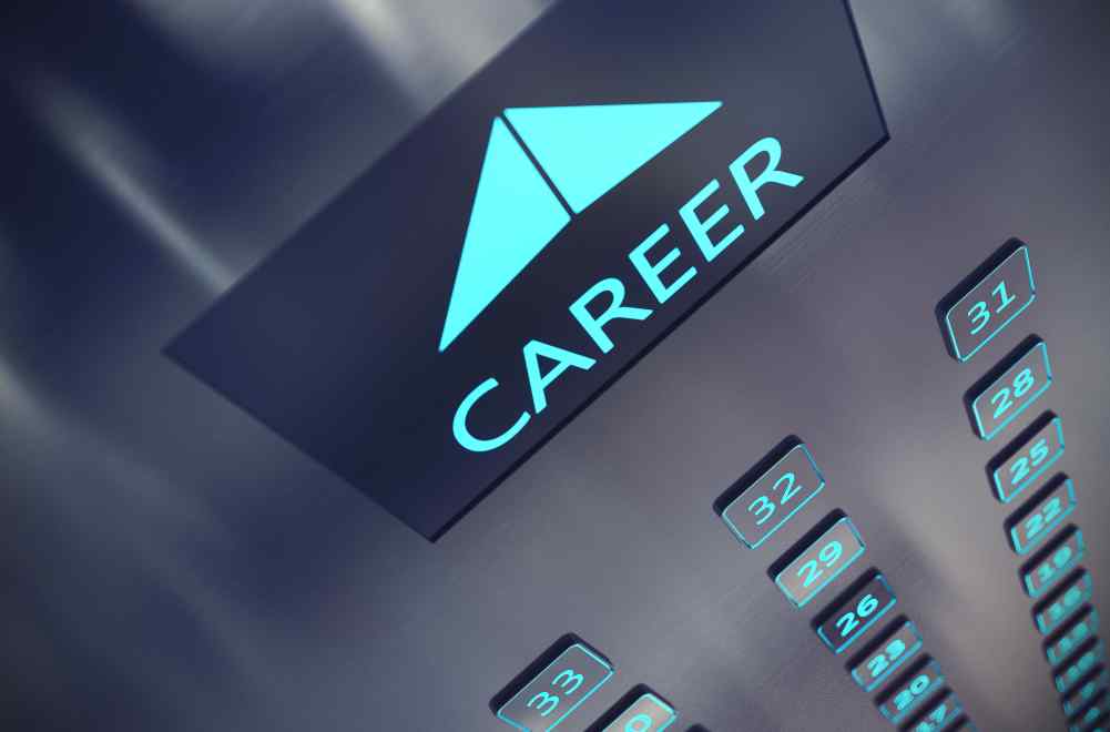 Photograph showing elevator buttons for many floors, with the word Career and an up arrow at the top of the image in bright turquoise, to symbolise "Elevating your career as a domestic insurance broker"
